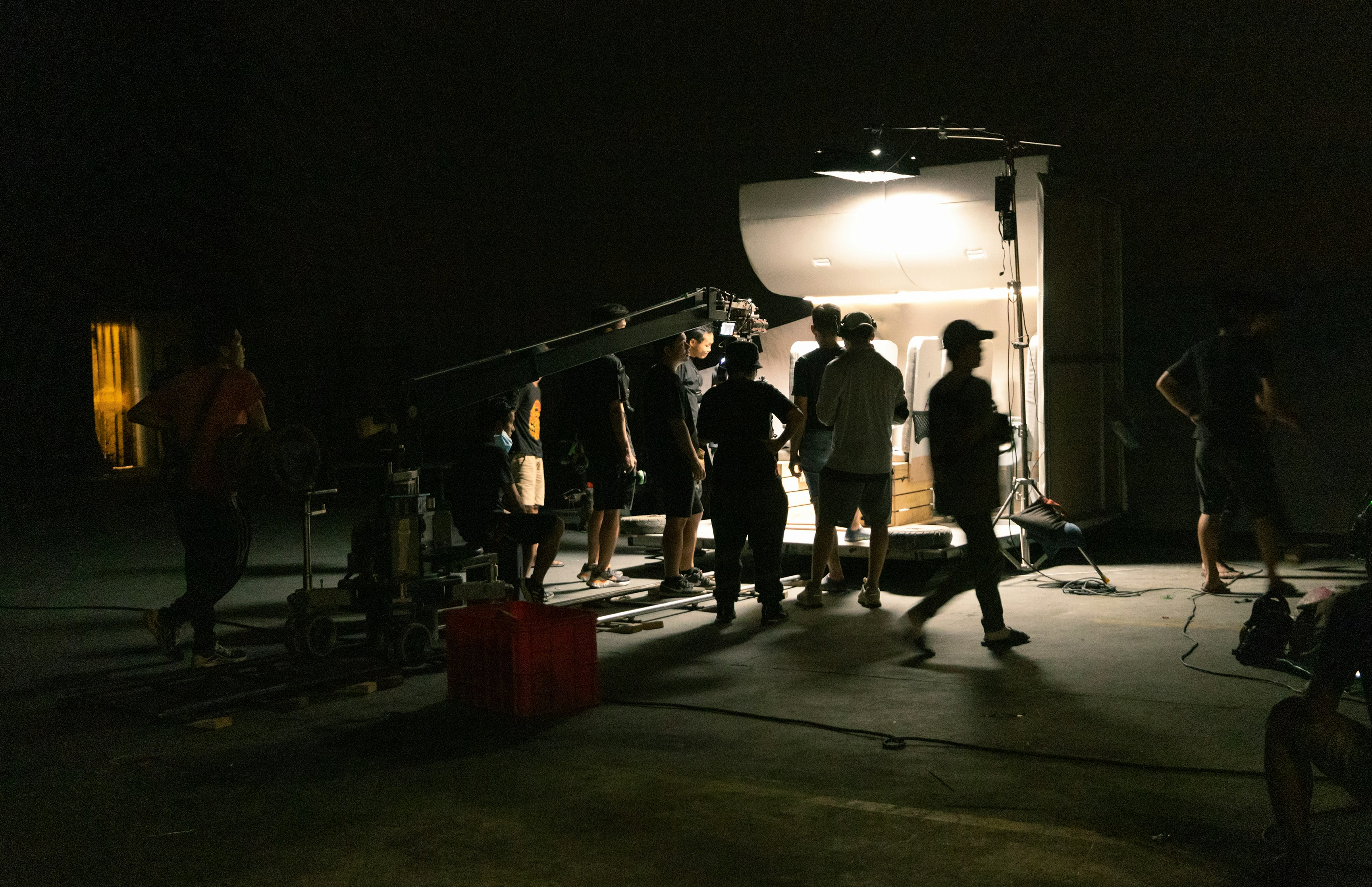 Film crew shooting on a studio set